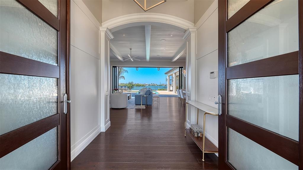 313 Lookout Point Drive Osprey, FL 34229 - Photo 26 of 100 a view of a hallway view with living room and with furniture