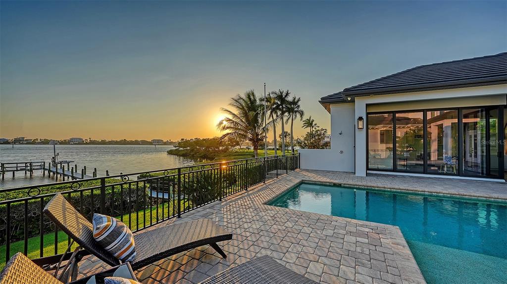 313 Lookout Point Drive Osprey, FL 34229 - Photo 88 of 100 a balcony with furniture and city view