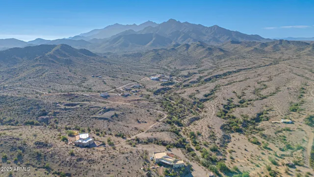 a view of mountain and mountains in the background