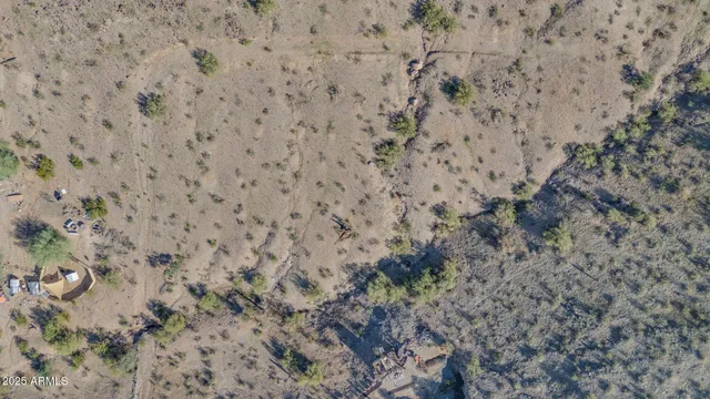 a view of mountains and valleys