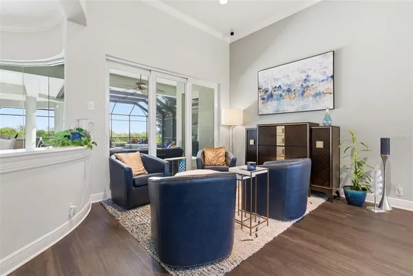 a large kitchen with kitchen island granite countertop a large counter top stainless steel appliances and cabinets