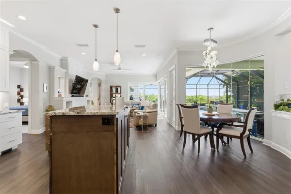 a spacious bathroom with a granite countertop sink a mirror and a