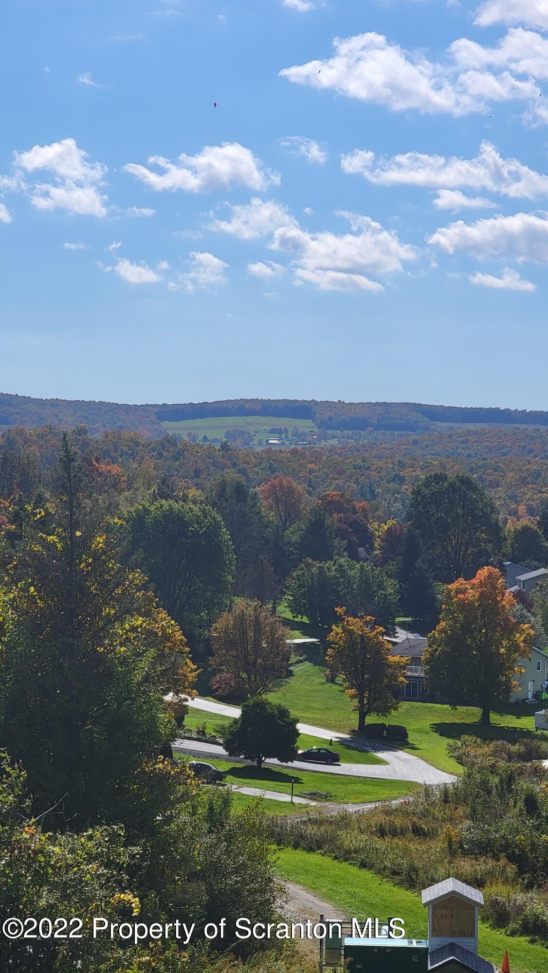 45 Highpoint Drive Factoryville, PA 18419 - Photo 18 of 22 an aerial view of residential houses with outdoor space and trees