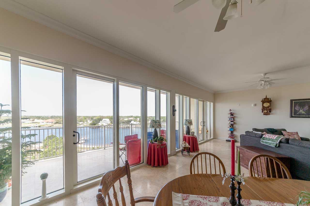 13928 River Road, Unit 504 Perdido Key, FL 32507 - Photo 11 of 40 a living room with furniture and a large window