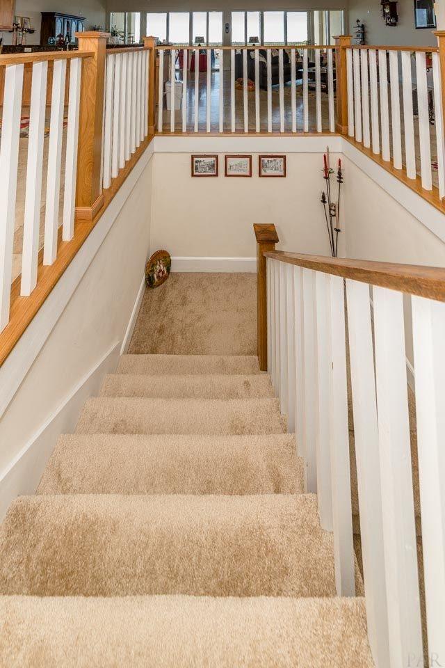 13928 River Road, Unit 504 Perdido Key, FL 32507 - Photo 20 of 40 a view of entryway with a tub and stairs