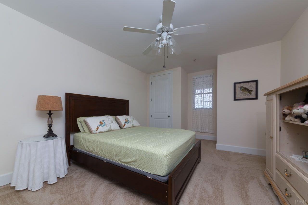 13928 River Road, Unit 504 Perdido Key, FL 32507 - Photo 27 of 40 a bedroom with a bed and window
