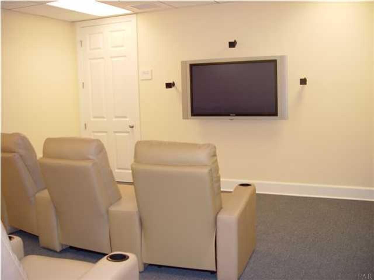 13928 River Road, Unit 504 Perdido Key, FL 32507 - Photo 35 of 40 a living room with furniture and a flat screen tv