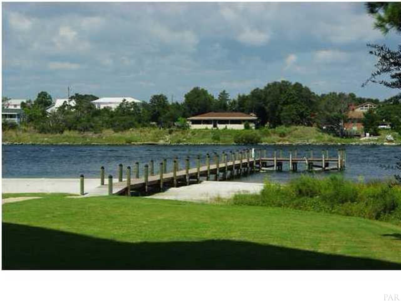 13928 River Road, Unit 504 Perdido Key, FL 32507 - Photo 37 of 40 a view of an house with a big yard