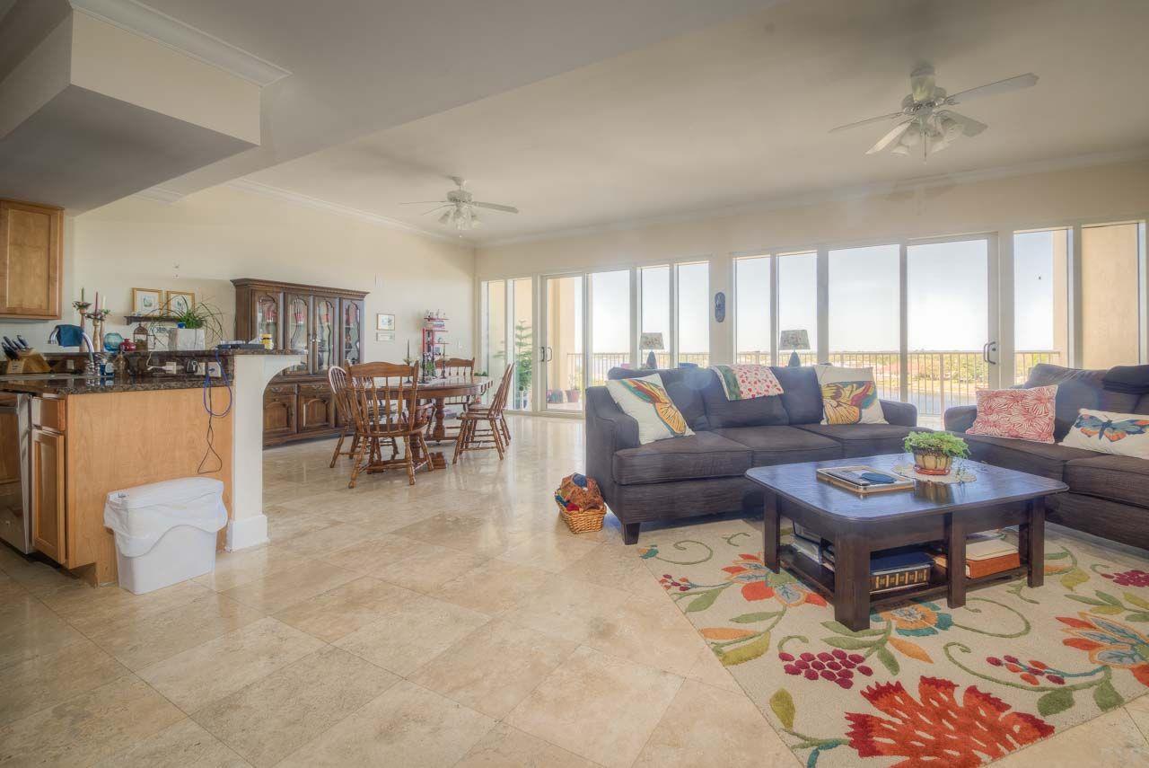 13928 River Road, Unit 504 Perdido Key, FL 32507 - Photo 5 of 40 a living room with furniture and a large window