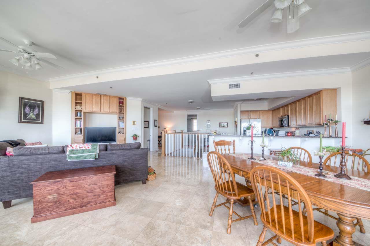 13928 River Road, Unit 504 Perdido Key, FL 32507 - Photo 7 of 40 a view of a dining room with furniture