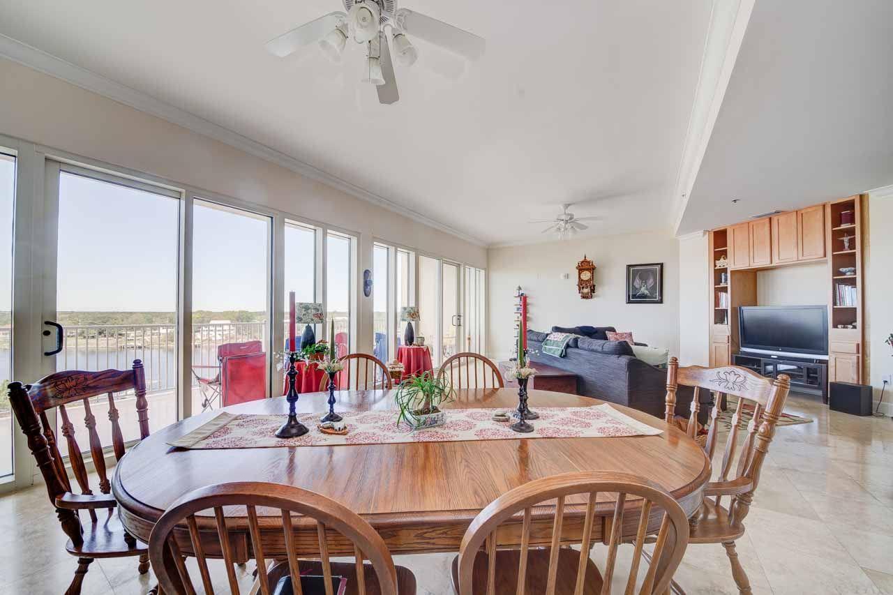 13928 River Road, Unit 504 Perdido Key, FL 32507 - Photo 8 of 40 a view of a dining room with furniture window and outside view
