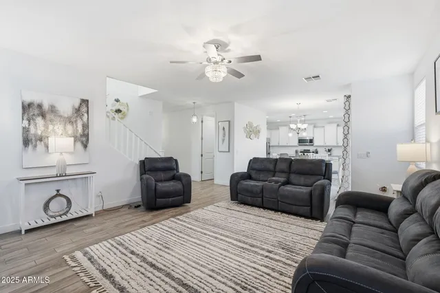 a bathroom with double vanity sink and a mirror