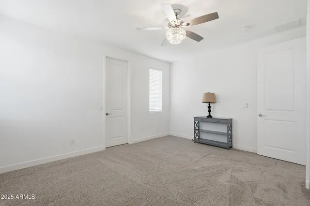 a bedroom with a bed and a cabinets