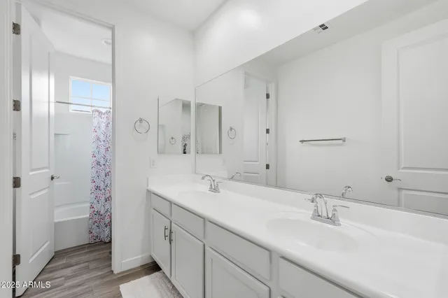 a view of a pathway with a yard