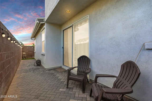 a view of an ocean with a building in the background