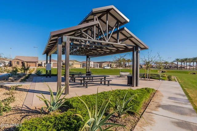 a view of a chairs and tables in patio