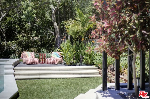 a bedroom with a bed and a walk in closet