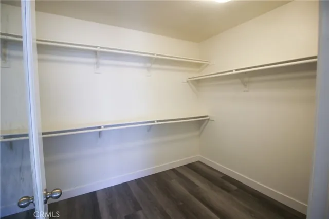 a view of an empty walk in closet