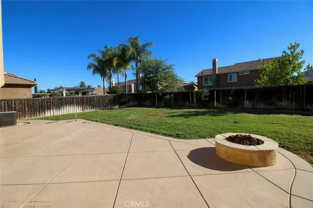 a front view of house with outdoor space and lake view