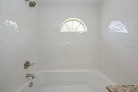 a bathroom with a tub