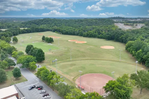 a view of a lake with a yard