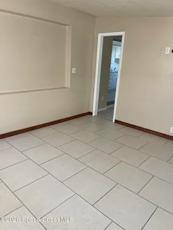 a view of a room with an empty space