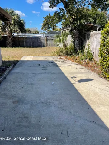 a view of outdoor space with swimming pool