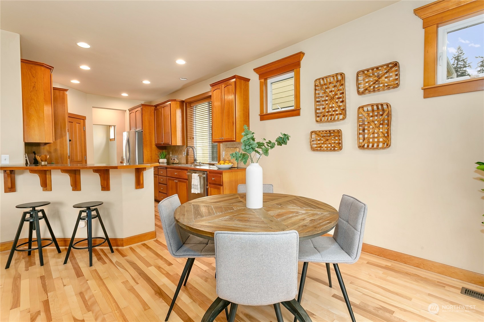 16725 Southeast 173rd Street Renton, WA 98058 - Photo 12 of 37 a dining room with furniture and wooden floor