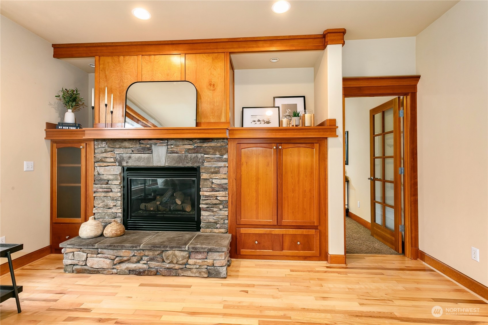 16725 Southeast 173rd Street Renton, WA 98058 - Photo 13 of 37 a living room with fireplace furniture and a wooden floor