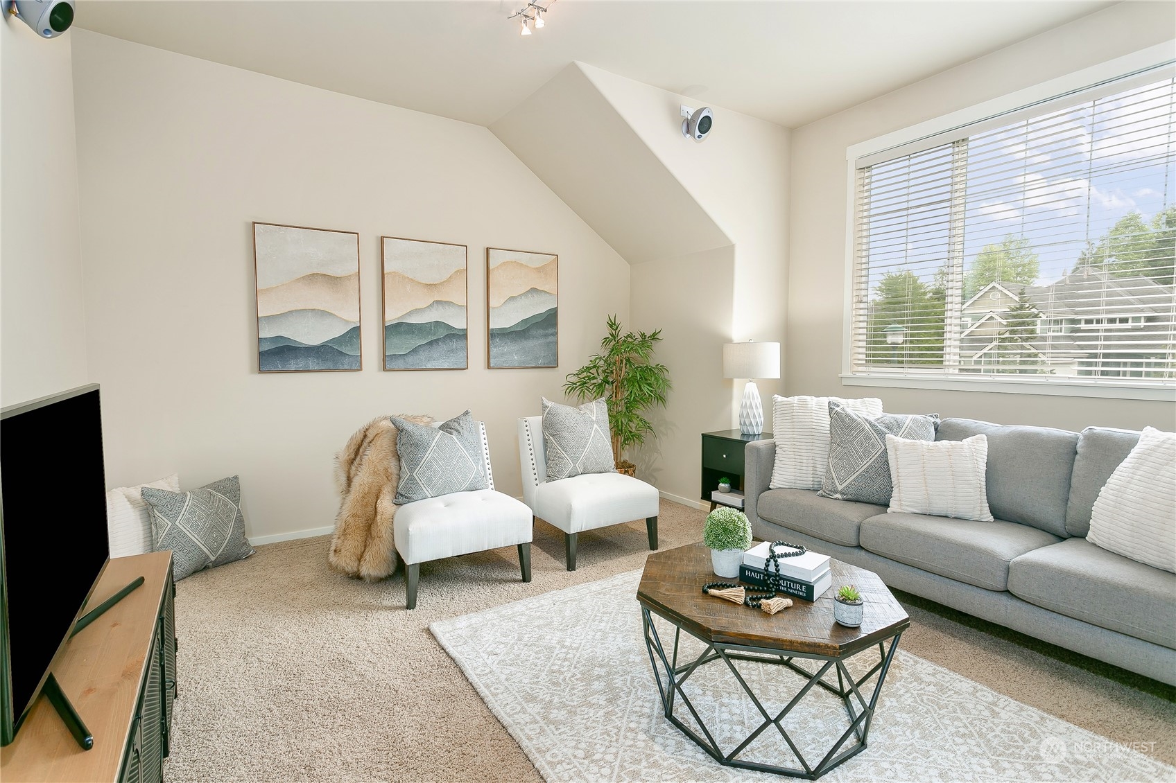 16725 Southeast 173rd Street Renton, WA 98058 - Photo 27 of 37 a living room with furniture potted plant and a large window
