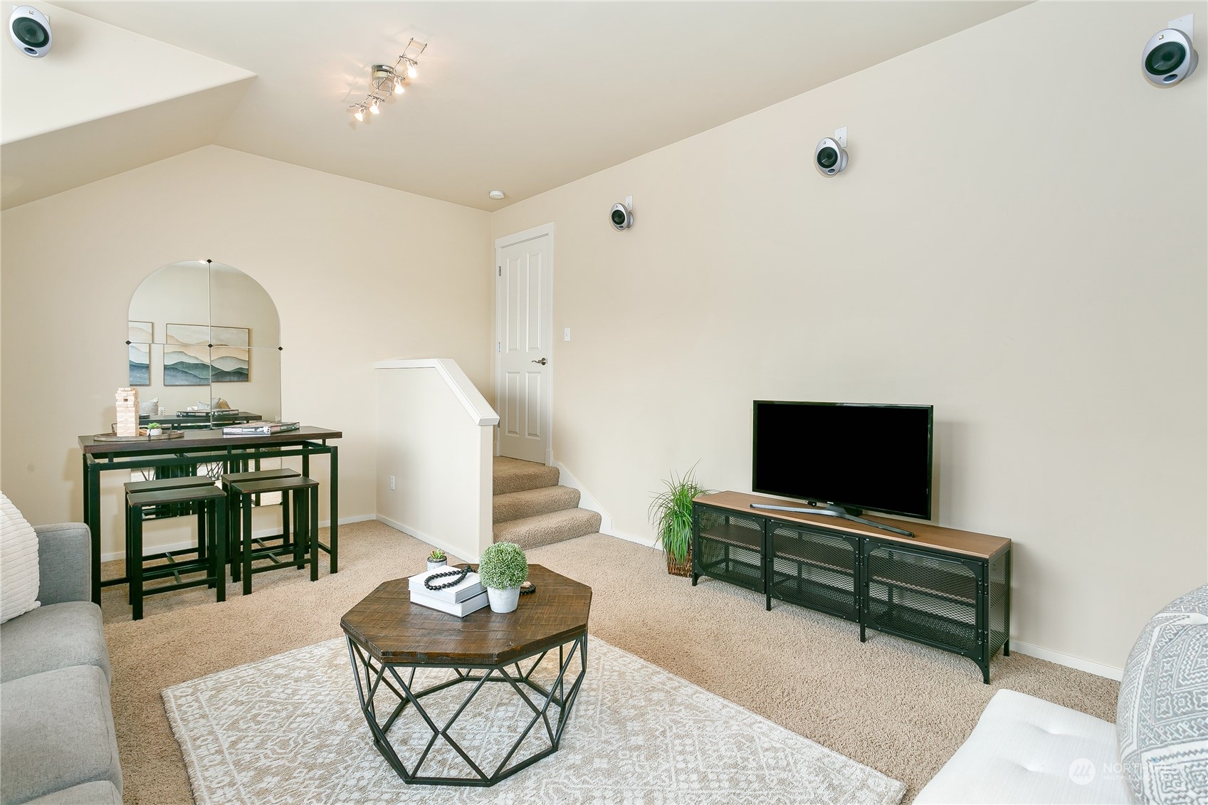 16725 Southeast 173rd Street Renton, WA 98058 - Photo 28 of 37 a living room with furniture and a flat screen tv