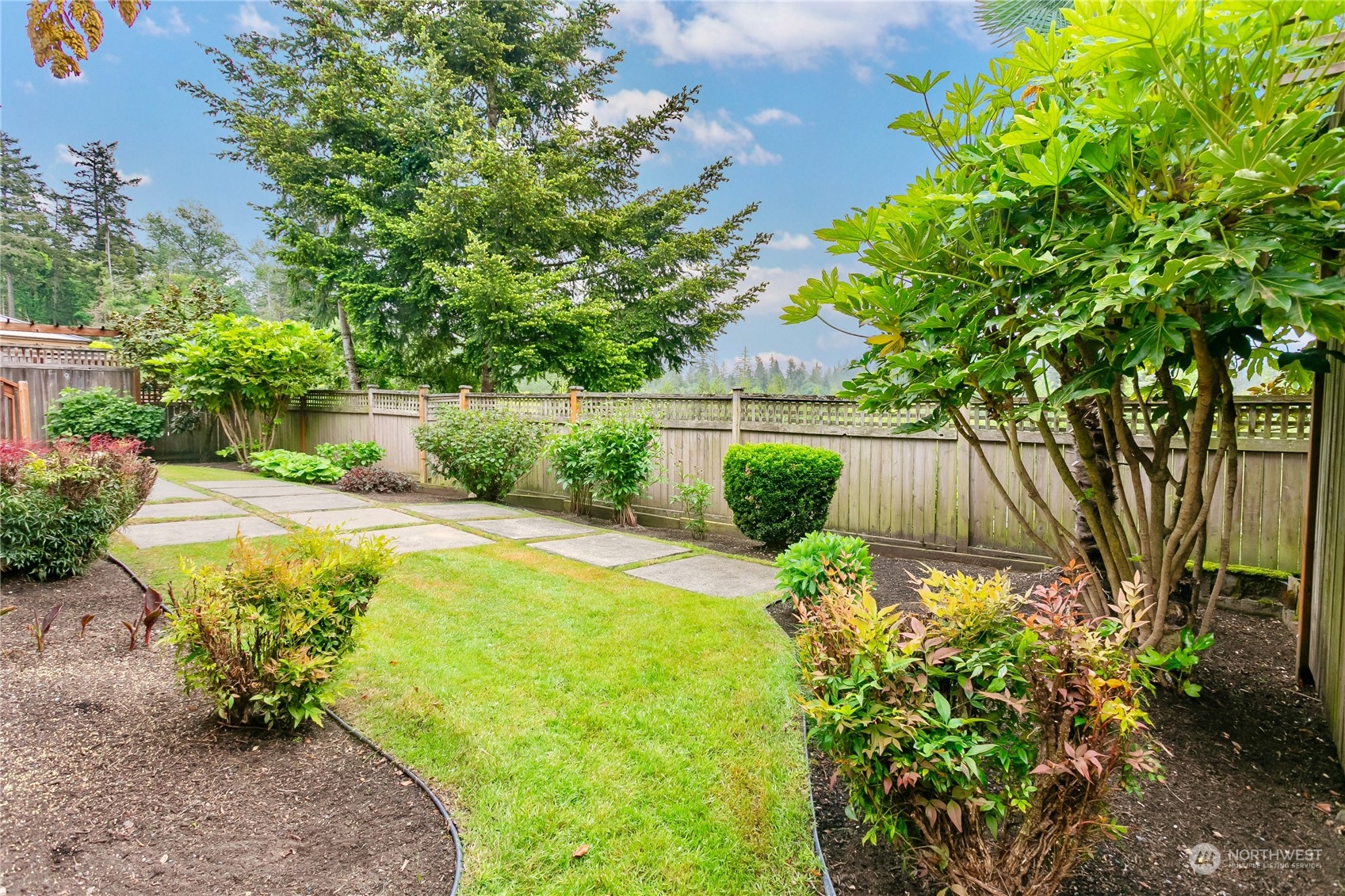 16725 Southeast 173rd Street Renton, WA 98058 - Photo 32 of 37 a view of a garden with plants