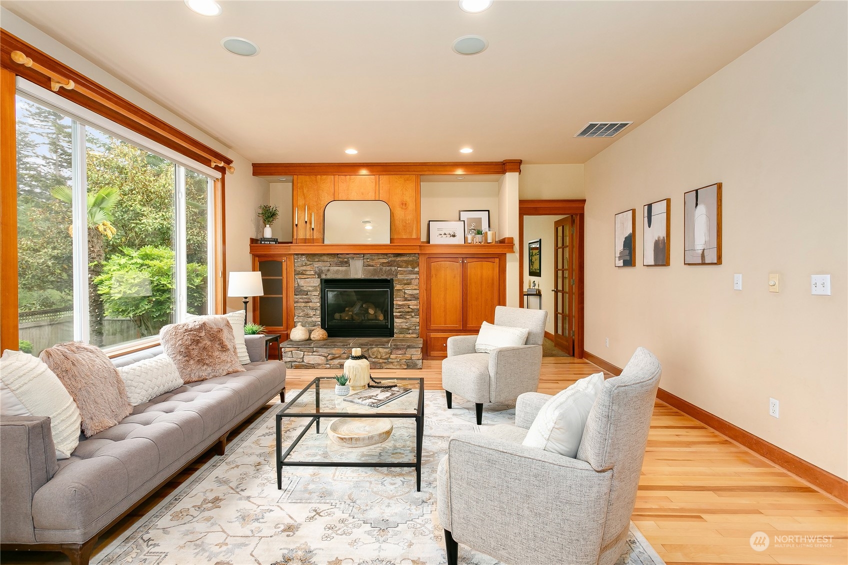 16725 Southeast 173rd Street Renton, WA 98058 - Photo 9 of 37 a living room with furniture and a fireplace