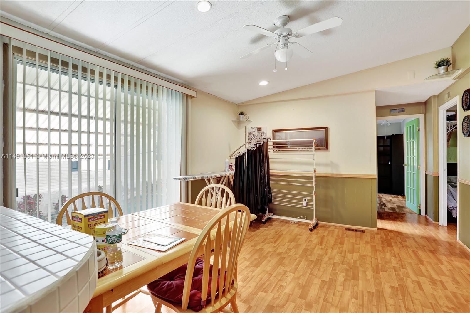 1640 Southwest 66th Avenue Boca Raton, FL 33428 - Photo 13 of 36 a bedroom with furniture and a window