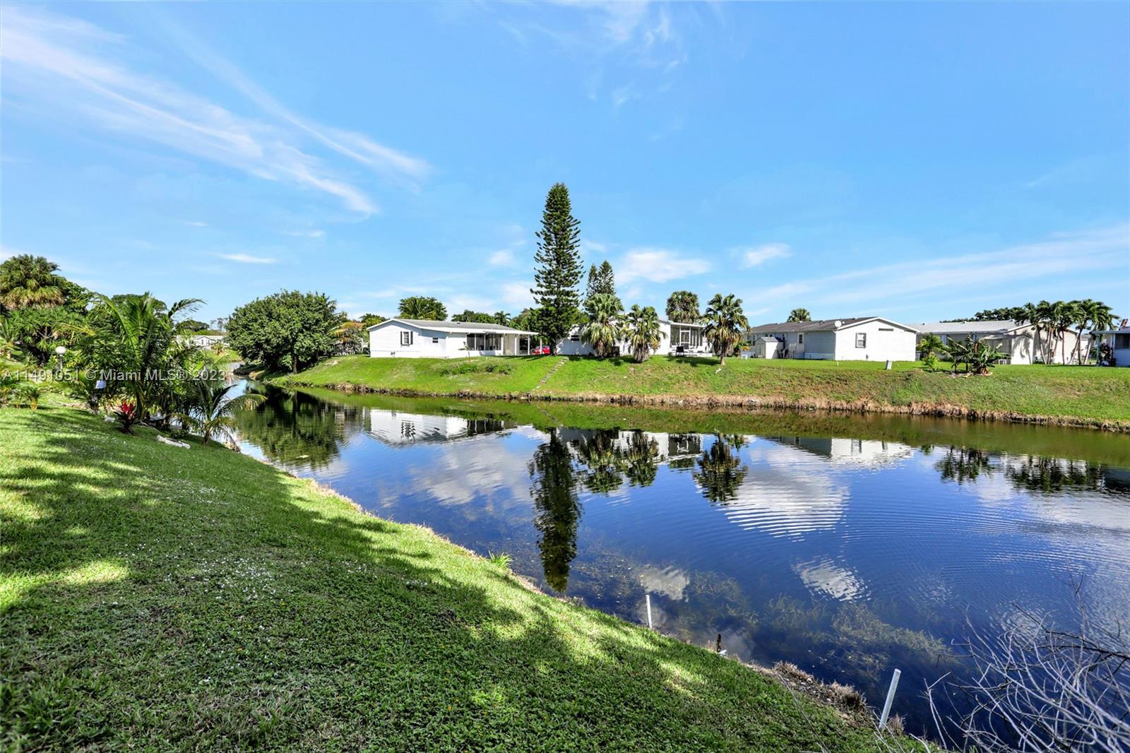 1640 Southwest 66th Avenue Boca Raton, FL 33428 - Photo 5 of 36 a view of a lake with outdoor space