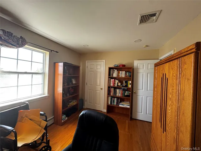 a room with furniture and a window