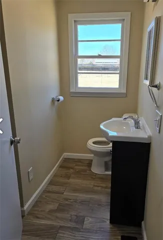 a bathroom with a sink and a toilet