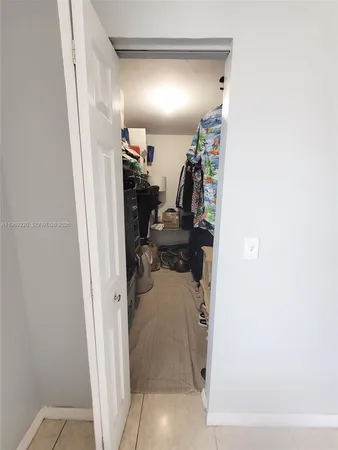 a view of a chairs and table in the balcony