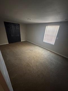 4630 Detroit Avenue Lubbock, TX 79413 - Photo 12 of 16 an empty room with windows