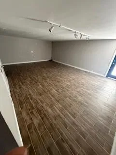 a view of a room with an empty space