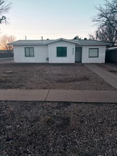 4630 Detroit Avenue Lubbock, TX 79413 - Photo 4 of 16 a view of a back yard of the house