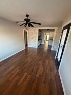 4630 Detroit Avenue Lubbock, TX 79413 - Photo 6 of 16 a view of empty room with wooden floor