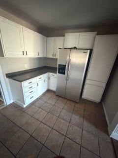 4630 Detroit Avenue Lubbock, TX 79413 - Photo 9 of 16 a kitchen with stainless steel appliances a refrigerator sink and cabinets