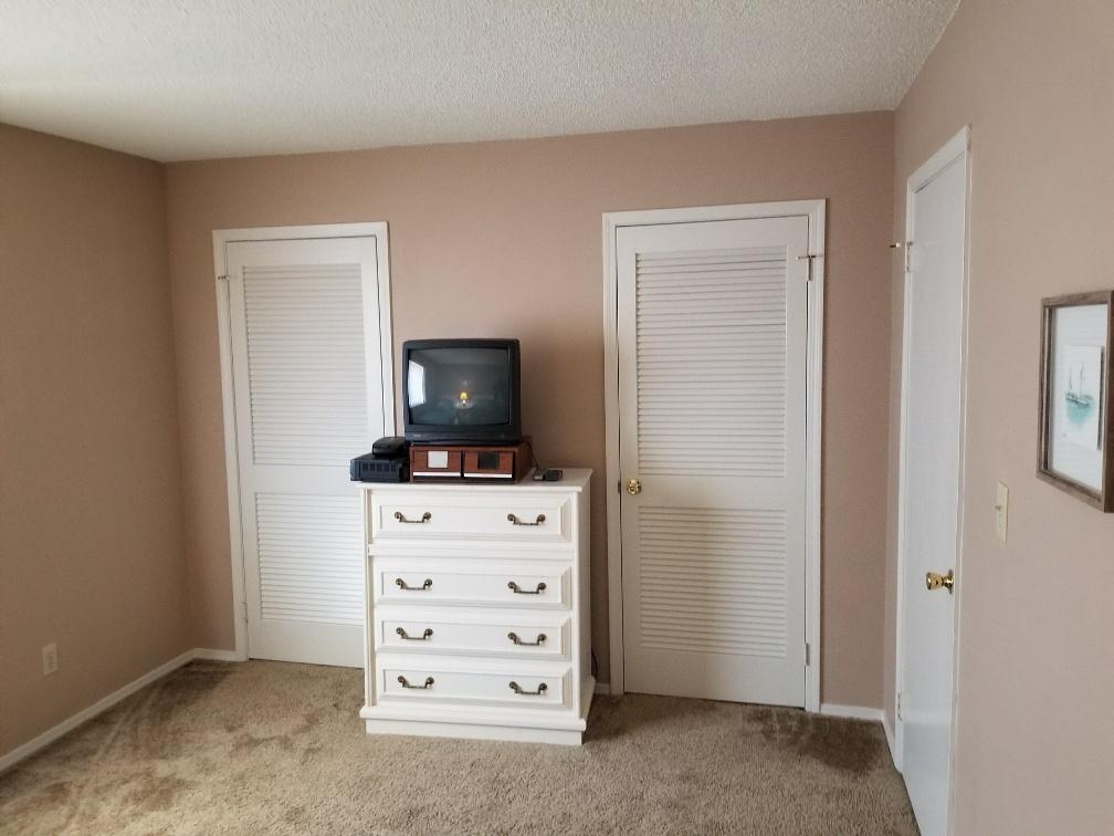 60 Sandprints Drive, Unit A2 Miramar Beach, FL 32550 - Photo 15 of 23 a view of walk in closet with empty racks