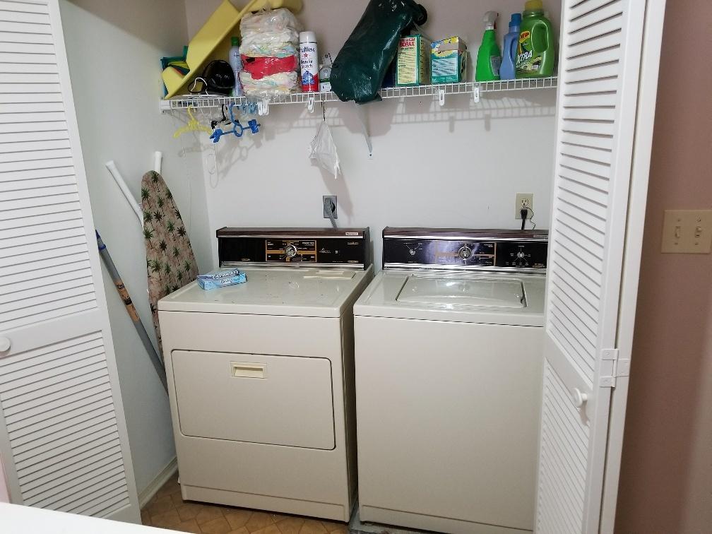60 Sandprints Drive, Unit A2 Miramar Beach, FL 32550 - Photo 18 of 23 a utility room with dryer and washer