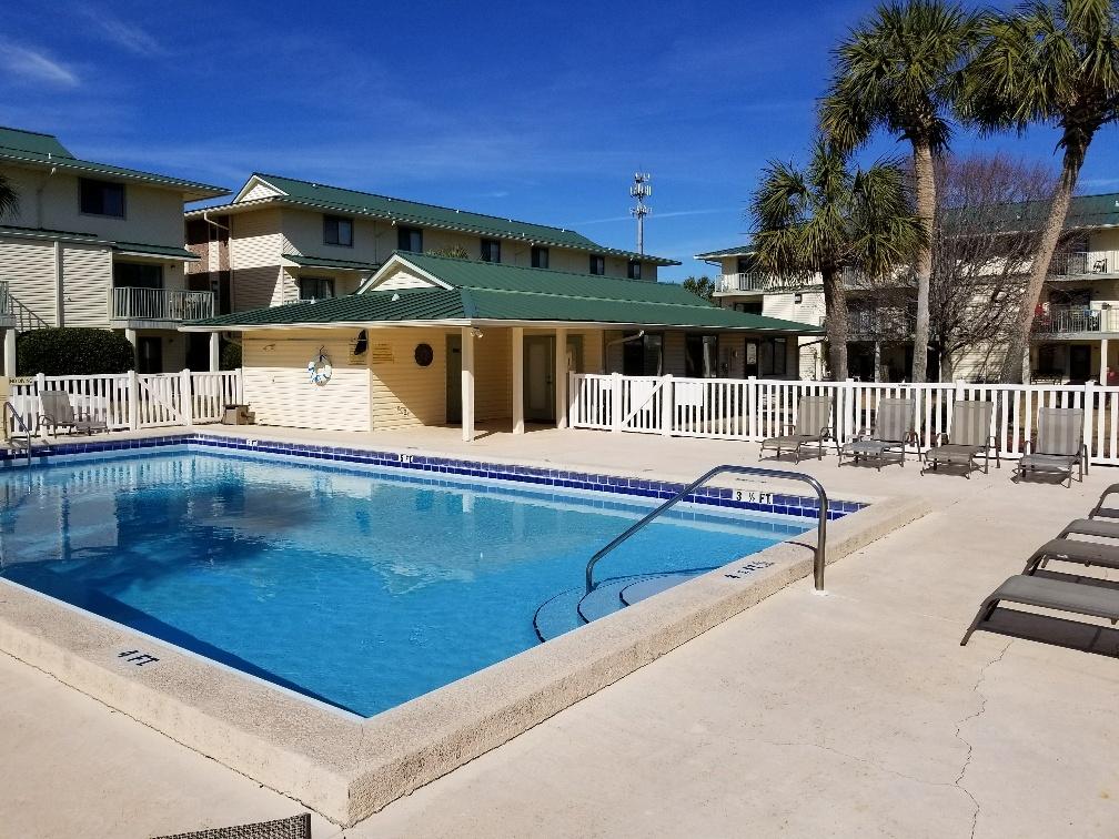60 Sandprints Drive, Unit A2 Miramar Beach, FL 32550 - Photo 5 of 23 a swimming pool with outdoor seating