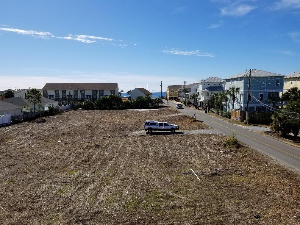 60 Sandprints Drive, Unit A2 Miramar Beach, FL 32550 - Photo 6 of 23 a car parked on the side of the road