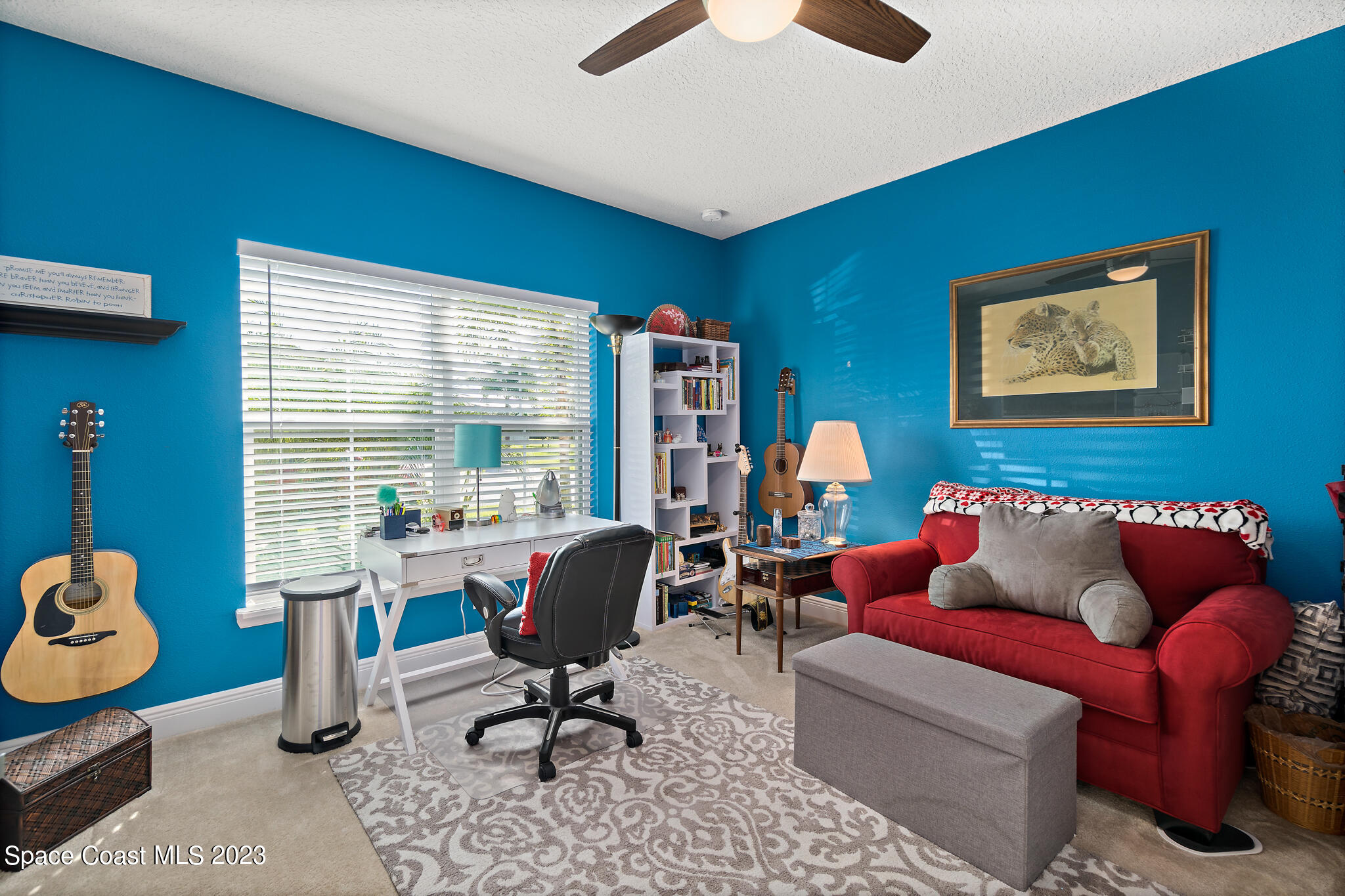 4465 Ruthann Circle Melbourne, FL 32934 - Photo 27 of 42 a work room with furniture and a window
