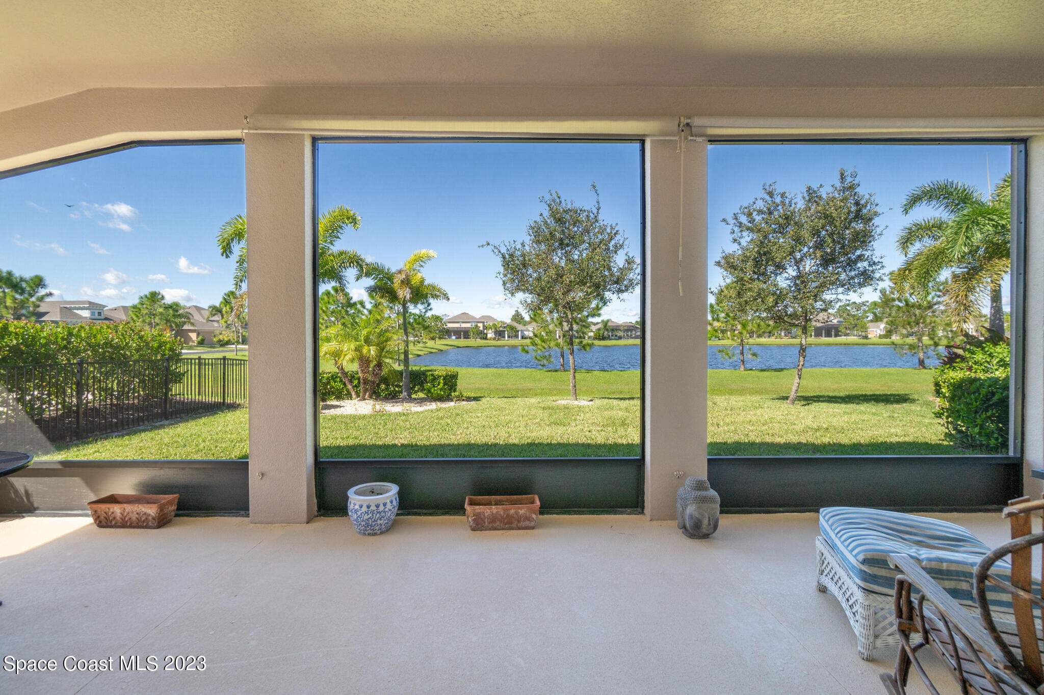 4465 Ruthann Circle Melbourne, FL 32934 - Photo 3 of 42 a view of backyard with outdoor seating and plants