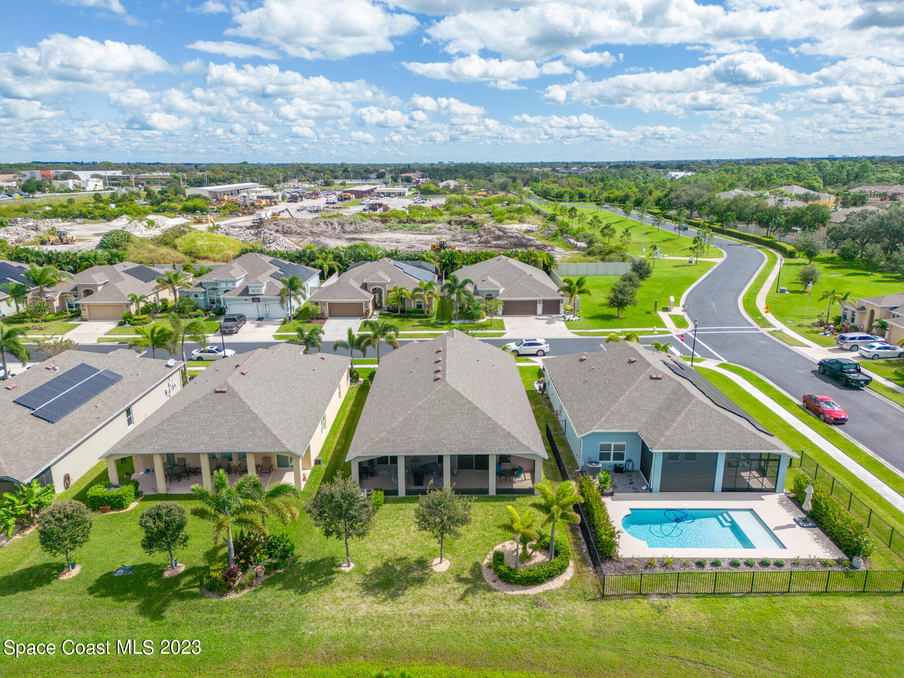 4465 Ruthann Circle Melbourne, FL 32934 - Photo 37 of 42 an aerial view of residential houses with outdoor space and swimming pool